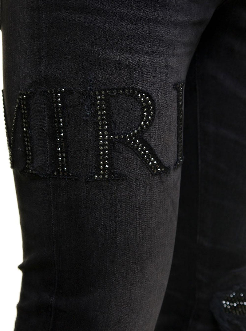 AMIRI Black Skinny Jeans With Crystal Embellished Logo And Used Effect In Stretch Cotton Denim Man - Men - Piano Luigi