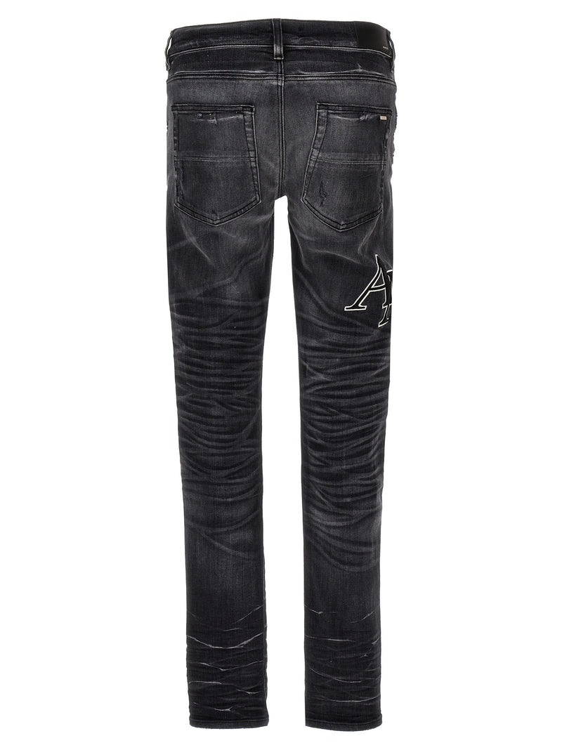 AMIRI straggered Logo Jeans - Men