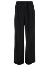 Saint Laurent Black Jogger Pants With Elastic Waistband In Cupro Man - Men