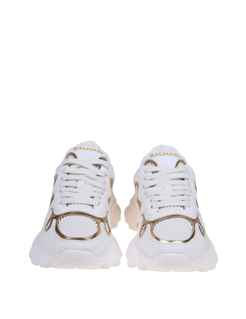 Balmain B-east Sneakers In White And Gold Suede And Leather - Women