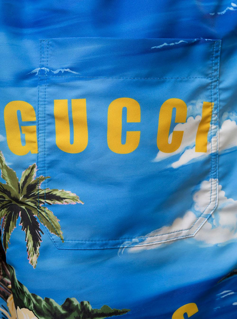 Gucci Light-blue Swim Shorts With All-over Graphic Print In Nylon Man - Men - Piano Luigi