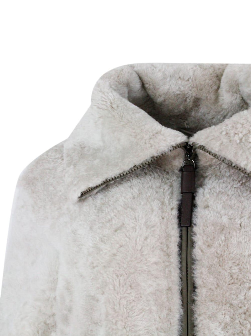 Brunello Cucinelli Long Coat In Precious And Refined Shearling Sheepskin With Zip Closure Embellished With Rows Of Brilliant Jewels And With Front Pockets - Women - Piano Luigi