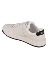 Prada Logo Plaque Perforated Sneakers - Women - Piano Luigi