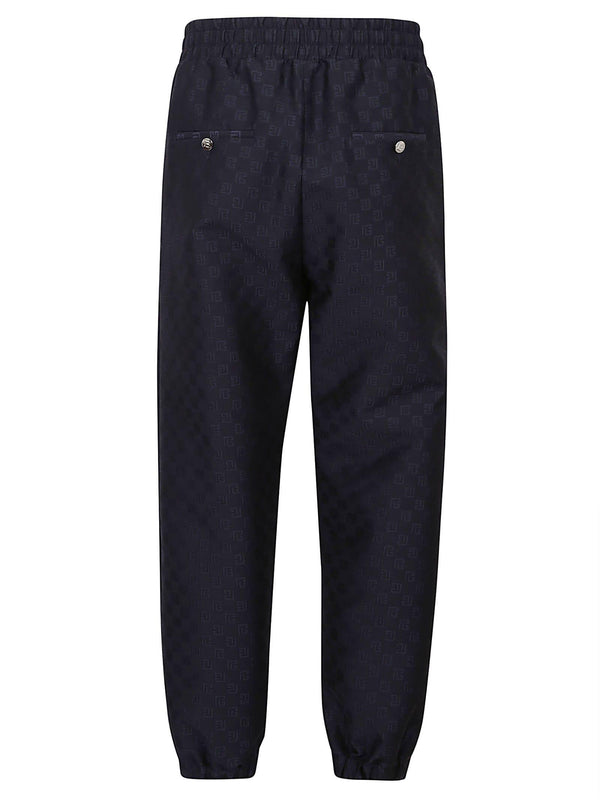 Balmain Mini Monogram Jacquard Wool Track Pants - Men - Piano Luigi