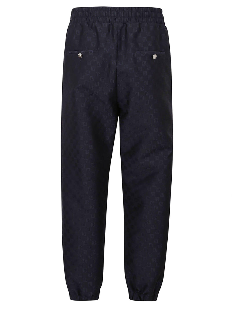 Balmain Mini Monogram Jacquard Wool Track Pants - Men - Piano Luigi