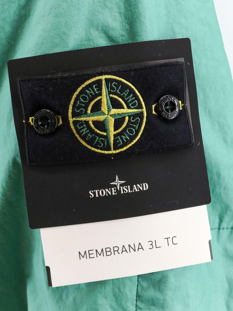 Stone Island Logo Patch Drawstring-hooded Raincoat - Men - Piano Luigi